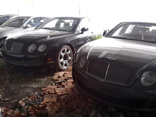 144 chiếc xe sang trong vụ án Dũng "mặt sắt" nằm phủ bụi - 4