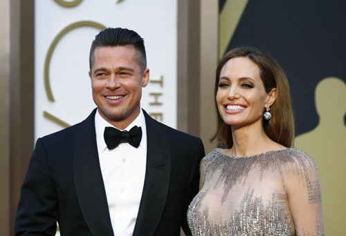 Brad Pitt và Angelina Jolie bán ảnh cưới với "giá bèo" - 2