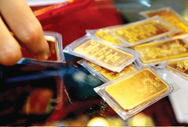 Giá vàng trong nước vẫn tiếp đà giảm - 1