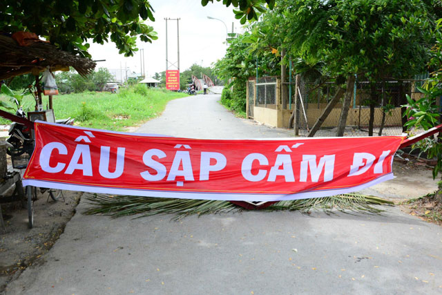 Cận cảnh cây cầu sập trong đêm giữa TPHCM - 11