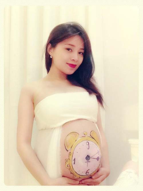 Ngắm bộ ảnh vẽ bụng bầu cực lãng mạn bên bờ biển - 6