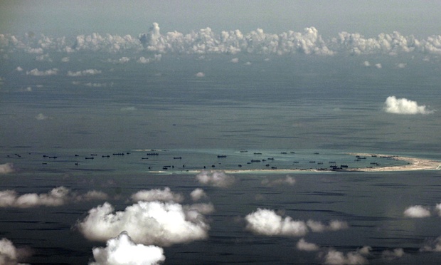 Nhật lên án Trung Quốc xây đảo trái phép trên Biển Đông - 1