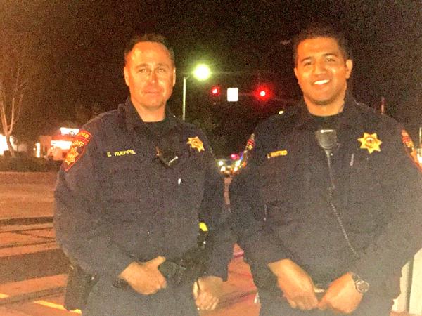 Mỹ: Cảnh sát liều mình cứu tài xế say xỉn trên đường tàu - 1