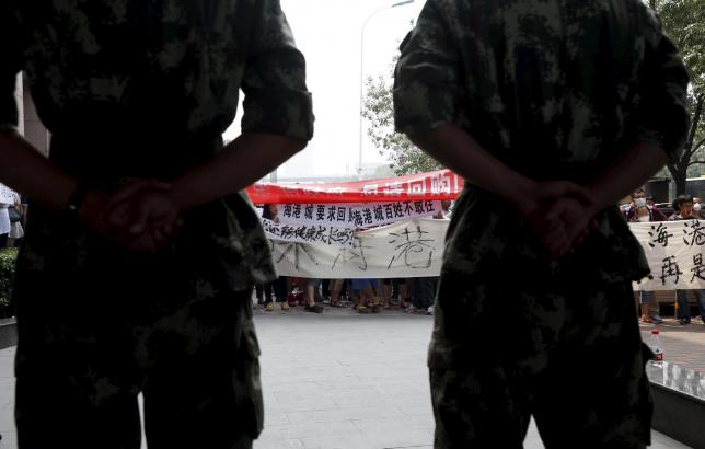 Nổ kho hóa chất TQ: Người dân giận dữ biểu tình đòi bồi thường - 4