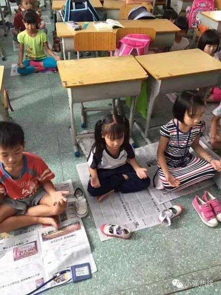 Trung Quốc: Học sinh tiểu học... ngồi thiền thay ngủ trưa - 1
