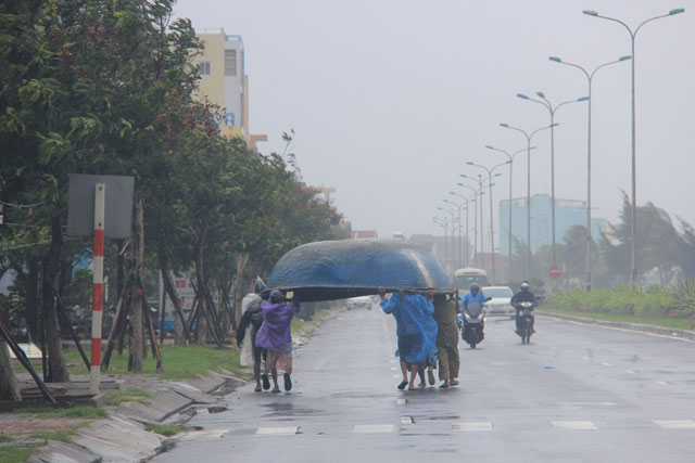 Bão số 3 suy yếu thành áp thấp nhiệt đới - 11