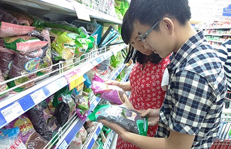 "Gánh" gạo bán tận nhà khách hàng - 1