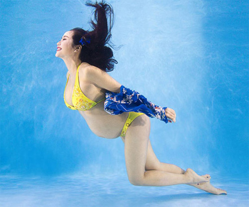 Ngắm ảnh bụng bầu gợi cảm của mỹ nhân Việt - 5