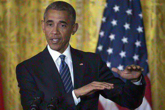 Obama: Trump đang tự chứng minh không thể làm tổng thống - 1