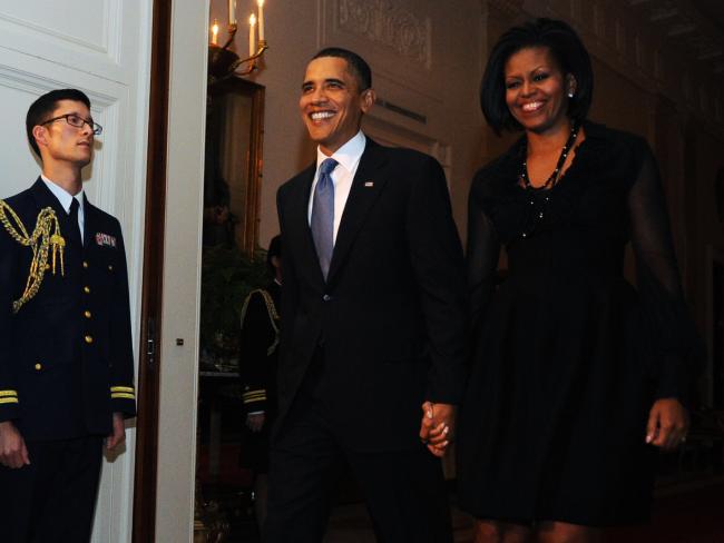 Ảnh: 7 năm làm tổng thống, Obama già đi thế nào? - 3