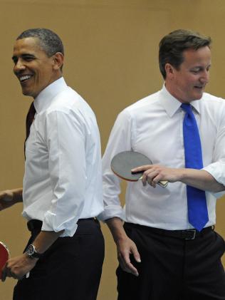 Ảnh: 7 năm làm tổng thống, Obama già đi thế nào? - 4