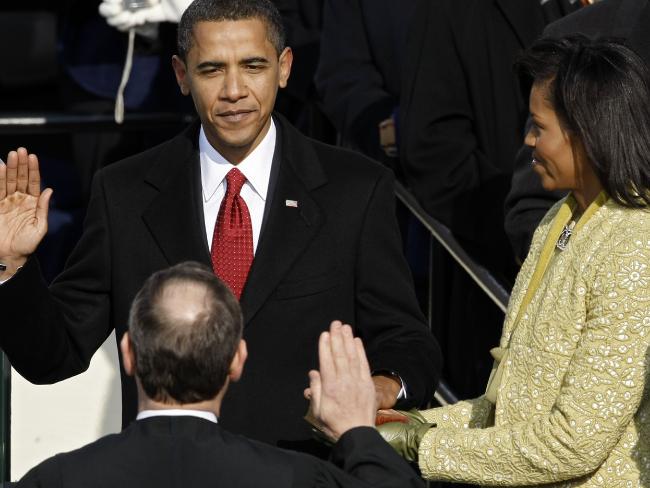 Ảnh: 7 năm làm tổng thống, Obama già đi thế nào? - 2