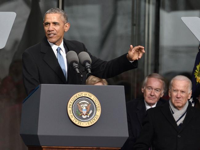 Ảnh: 7 năm làm tổng thống, Obama già đi thế nào? - 8