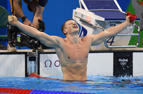 Tin nóng Olympic ngày 2: "Cậu bé vàng" bơi Anh phá KLTG - 1