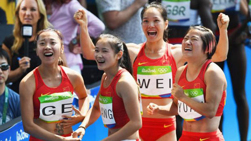 Bị loại 4x100m, đội điền kinh Trung Quốc kêu oan - 1