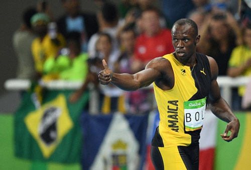 Usain Bolt thần tốc giành "hat-trick" HCV - 1