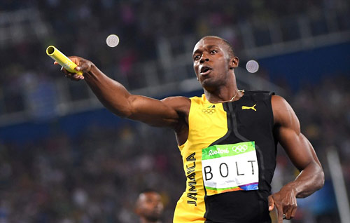Giải nghệ với cú ăn ba HCV, Bolt được mời làm Bộ trưởng - 1