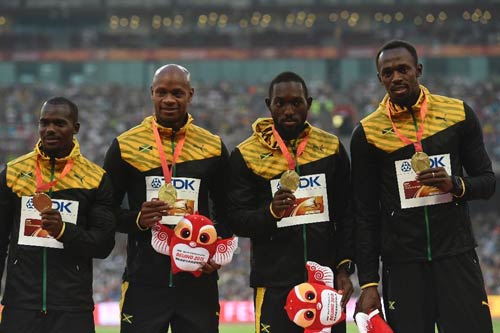 Sắp bị tước 1 HCV Olympic, Bolt chẳng hề lo lắng - 1