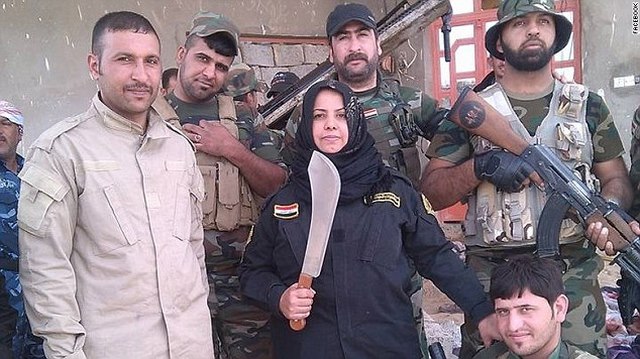 Góa phụ chuyên chặt đầu, thiêu xác khủng bố IS ở Iraq - 1