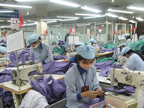 Lương lao động dệt may Việt Nam bằng một nửa Malaysia - 1