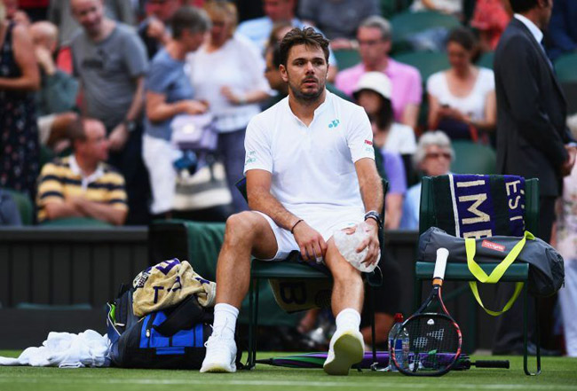 Wimbledon: Đầu gối &#34;nổi loạn&#34;, Wawrinka lập kỷ lục đáng buồn - 2