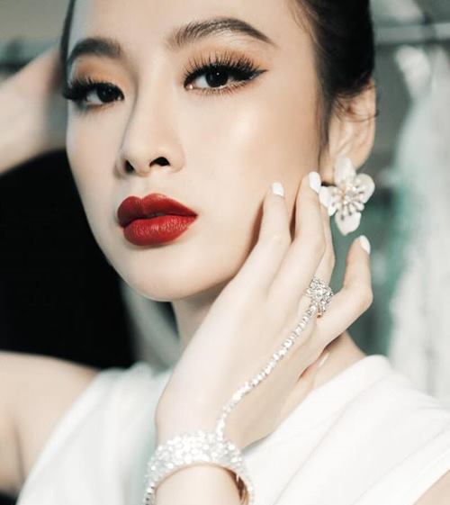 Nhìn lại chiếc mũi "biến hóa" theo thời gian của Angela Phương Trinh - 10