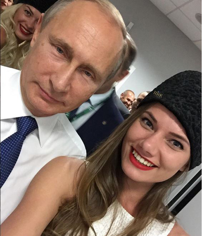 Dự tiệc rồi chụp ảnh với những người giàu có, quyền lực và nổi tiếng như Tổng thống Vladimir Putin.