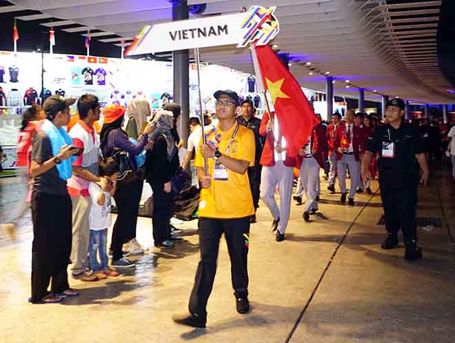 Khai mạc SEA Games 29: Trai tài gái sắc đoàn Việt Nam tỏa sáng - 1