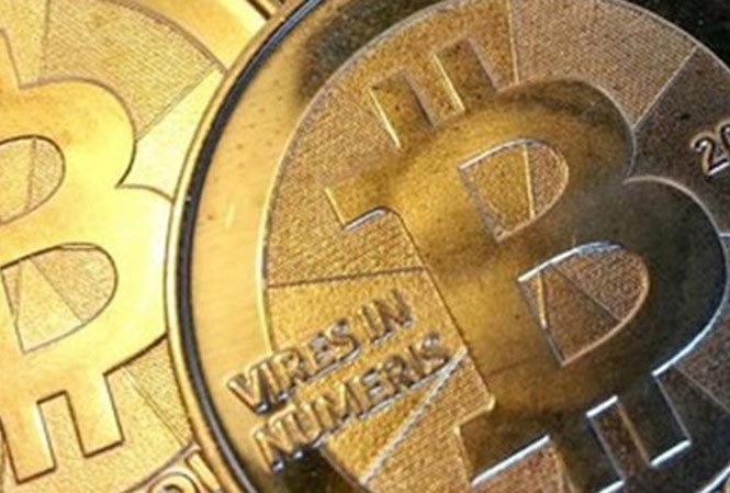 Ngân hàng Nhà nước bảo lưu quan điểm không công nhận tiền ảo Bitcoin - 1