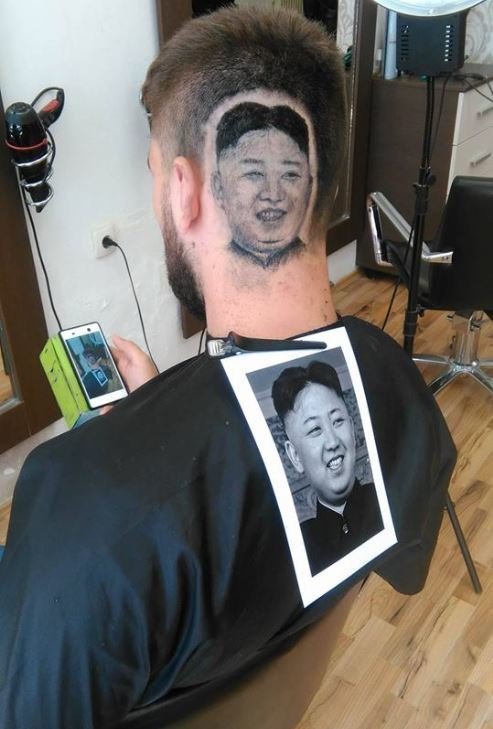 Nga: Cắt tóc ra hình khuôn mặt Kim Jong-un trên đầu khách - 1