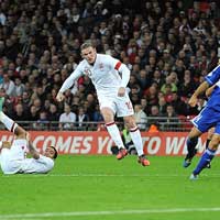 Bóng đá - Rooney: Một cú đúp, hai cột mốc