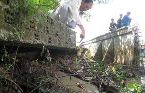 Thi công ì ạch, hà bá "nuốt" đường - 3