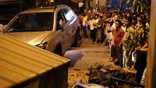 Bị xe Lexus tông, hai bố con chết thảm - 2