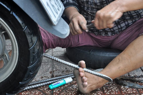 Những phụ nữ Sài Gòn làm việc của đàn ông - 11