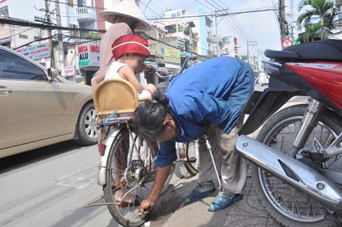 Những phụ nữ Sài Gòn làm việc của đàn ông - 13