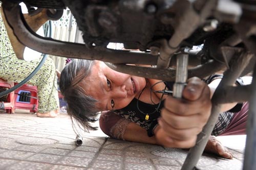 Những phụ nữ Sài Gòn làm việc của đàn ông - 4