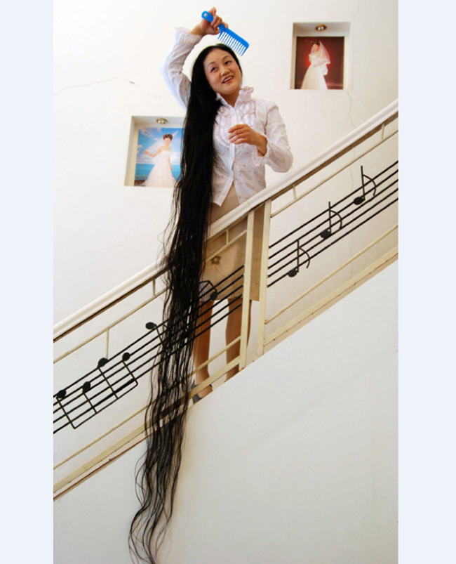 cô Xie Qiuping vô cùng tự hào về mái tóc của mình, mặc dù thời gian đã khiến mái tóc cô không được dày cho lắm
