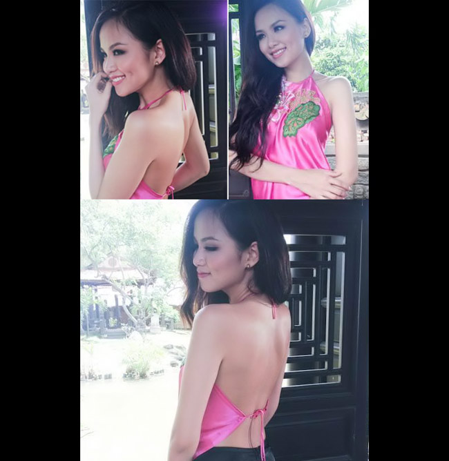 Hoa hậu Diễm Hương làm duyên với sắc hồng.
