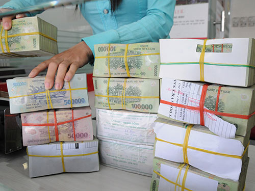 Tiền rách sắp được đổi miễn phí - 1