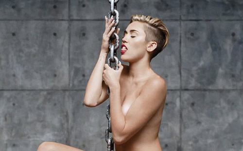 2013: Năm “hư hỏng” của Miley Cyrus - 4