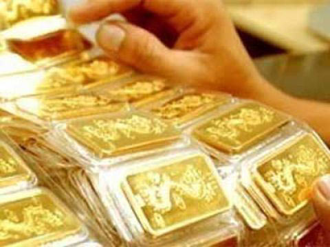 Giá vàng giảm sau 3 phiên tăng liên tiếp - 1