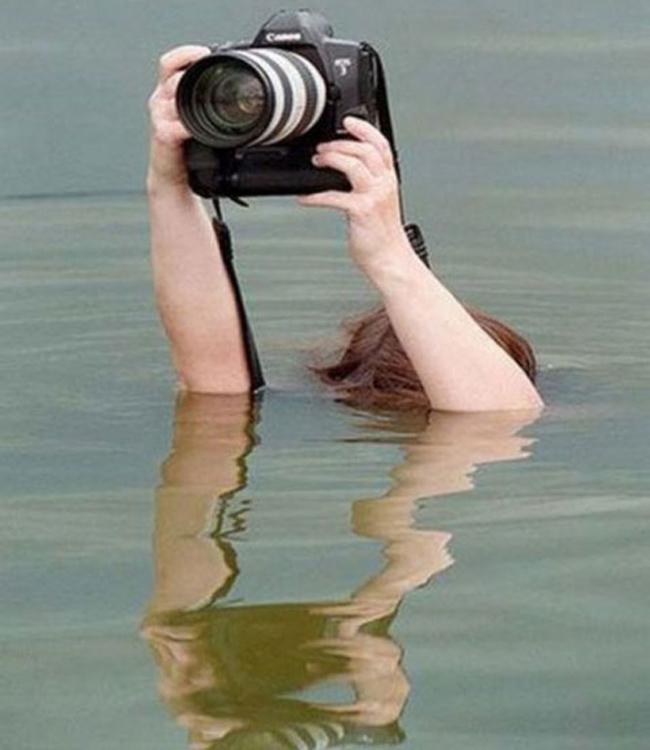 Ngụp lặn là chuyện thường của nhiếp ảnh gia

