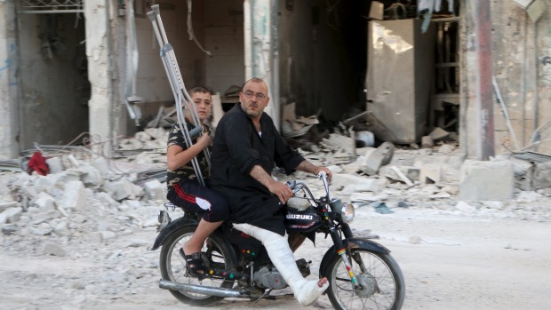 Ảnh: Cảnh thanh bình hiếm hoi trong đổ nát ở thủ đô Syria - 1