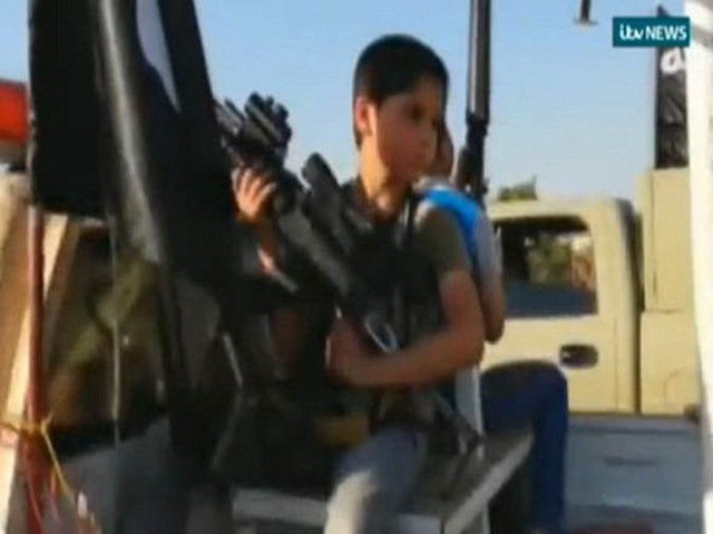 IS sử dụng trẻ khuyết tật làm chiến binh khủng bố - 1