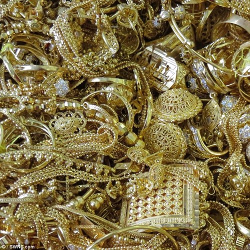 Đấu giá 150 kg vàng buôn lậu được định giá 82,5 tỉ đồng - 1