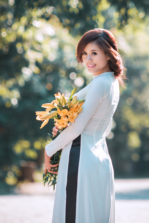 "Nữ hoàng điền kinh" xinh tươi trong trang phục áo dài - 2