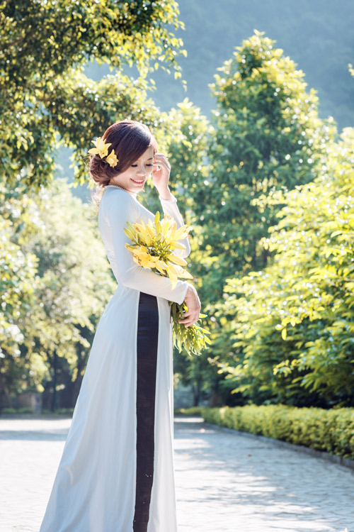 "Nữ hoàng điền kinh" xinh tươi trong trang phục áo dài - 5