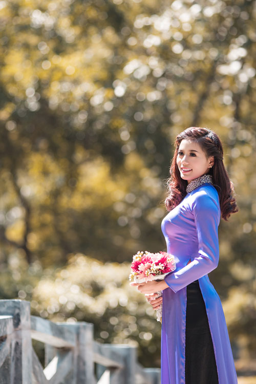 "Nữ hoàng điền kinh" xinh tươi trong trang phục áo dài - 8