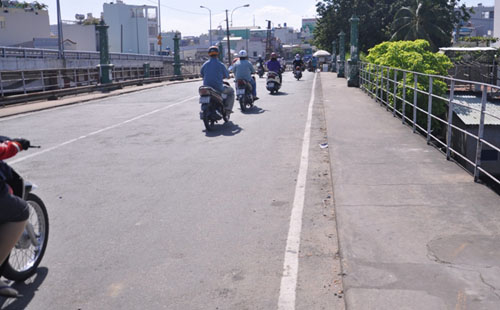 TP.HCM: “Khai tử” cây cầu gần trăm tuổi, người dân tiếc nuối - 11