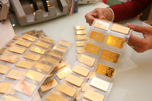 Dự báo giá vàng tiếp tục giảm trong năm 2016 - 1